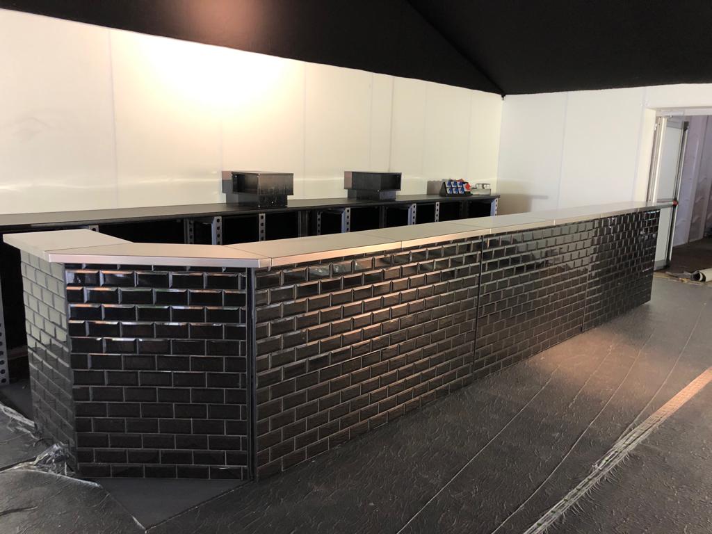 black tiled mobile bar