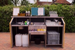 DIY cocktail bar as it comes delivered to a garden
