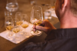 A Man Taking a Whisky Tasting Masterclass