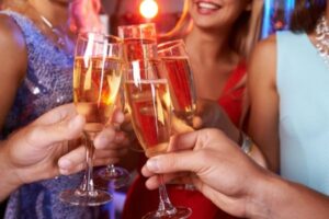 Group of young ladies having a champagne toast